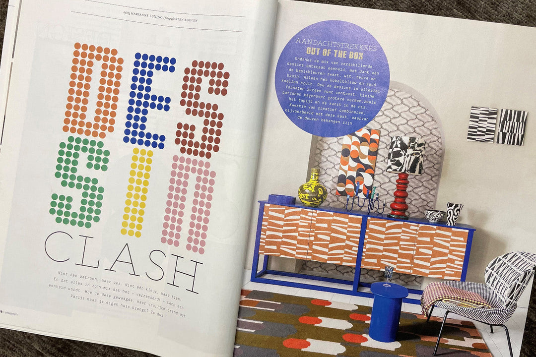 WIE DURFT? DESSIN CLASH OP EEN ACHTERGROND VAN LAB COLOURS